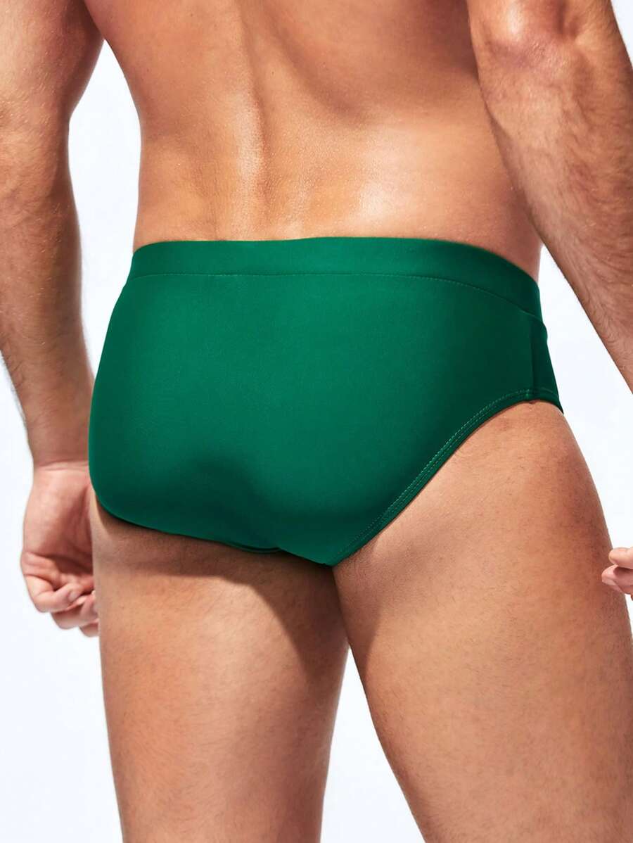 Manfinity Swimmode Calções de banho lisos com cintura elástica para homem