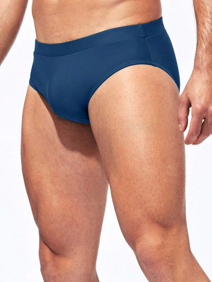 Manfinity Swimmode Calções de banho lisos com cintura elástica para homem