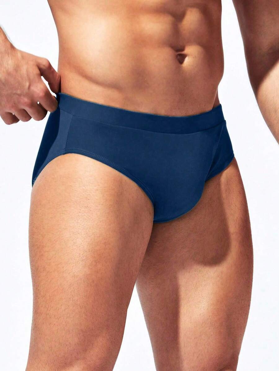 Manfinity Swimmode Calções de banho lisos com cintura elástica para homem