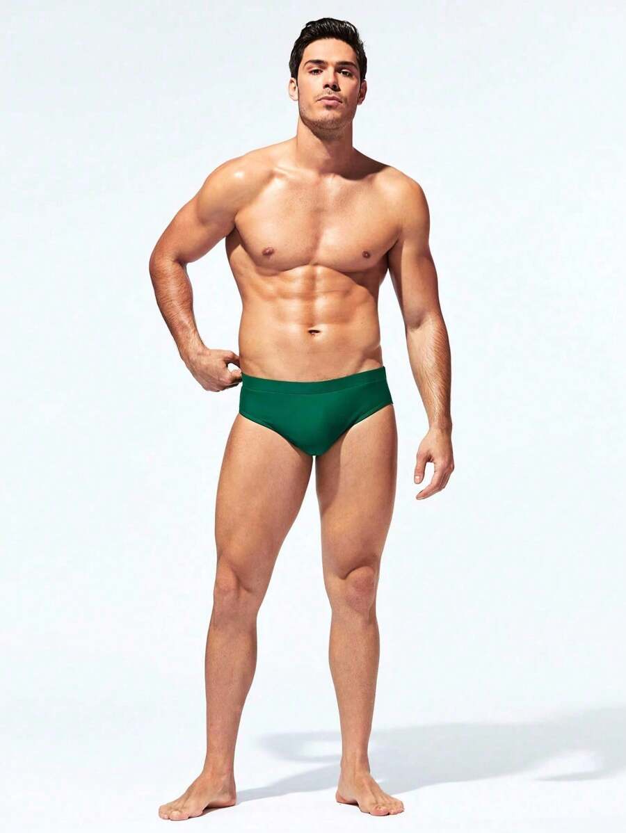 Manfinity Swimmode Calções de banho lisos com cintura elástica para homem