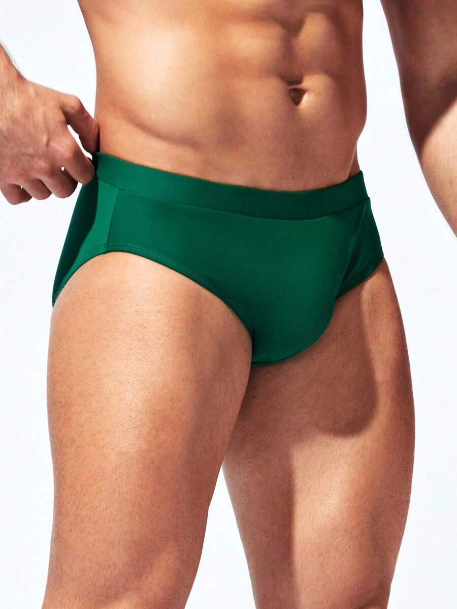 Manfinity Swimmode Calções de banho lisos com cintura elástica para homem