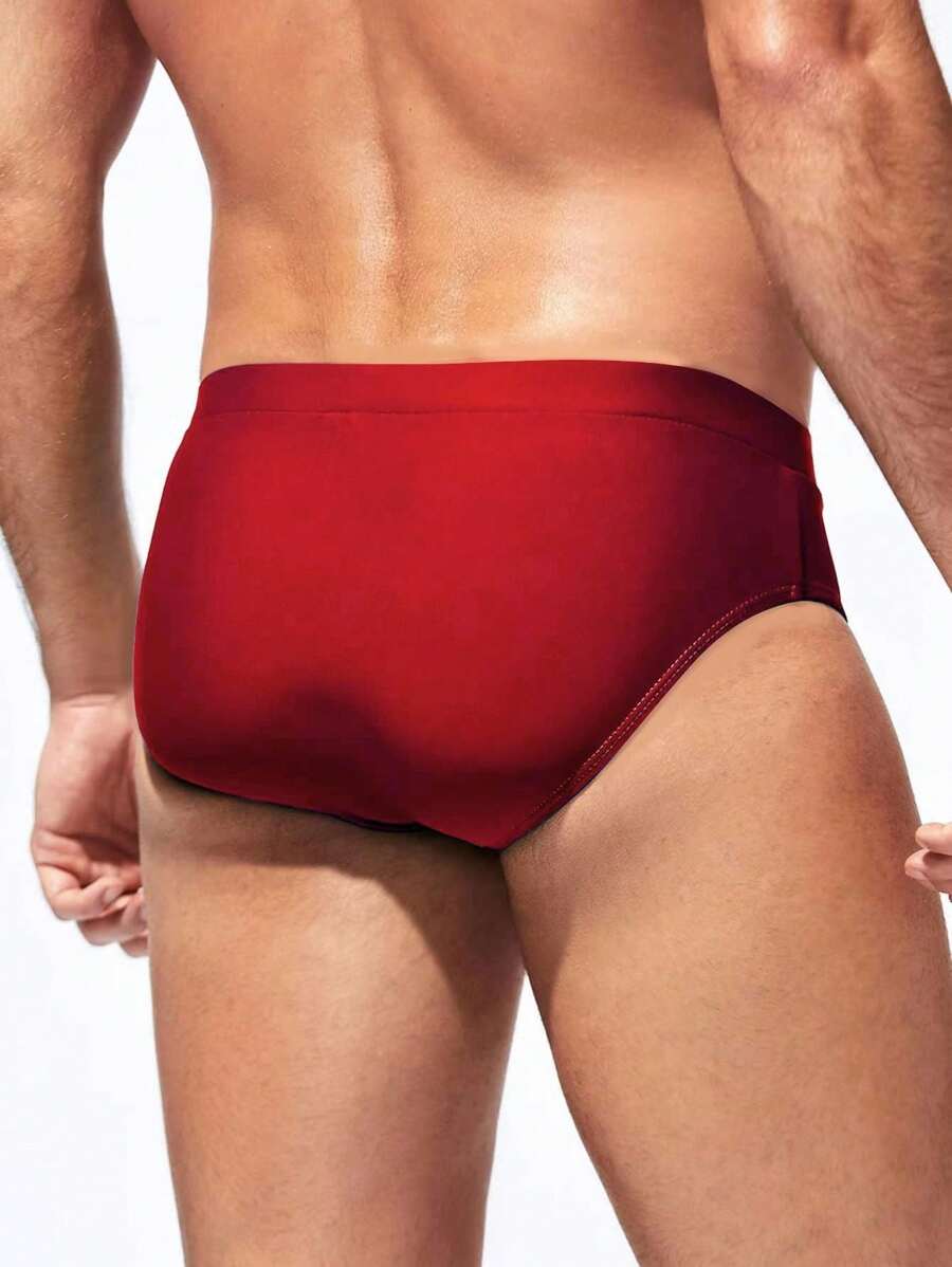 Manfinity Swimmode Calções de banho lisos com cintura elástica para homem
