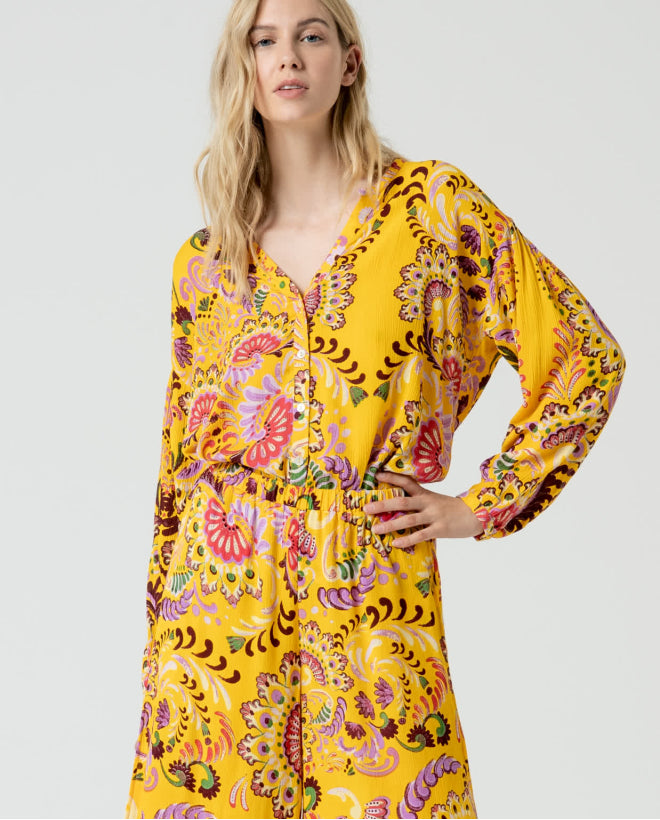 Blusa de manga curta com detalhe de ornamento Laranja
